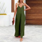 Side view of The Harlot Jumpsuit in green, showing flowy fit and lightweight fabric.
