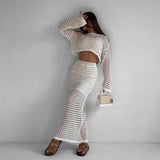 Model wearing white cotton two piece matching set styled with sandals