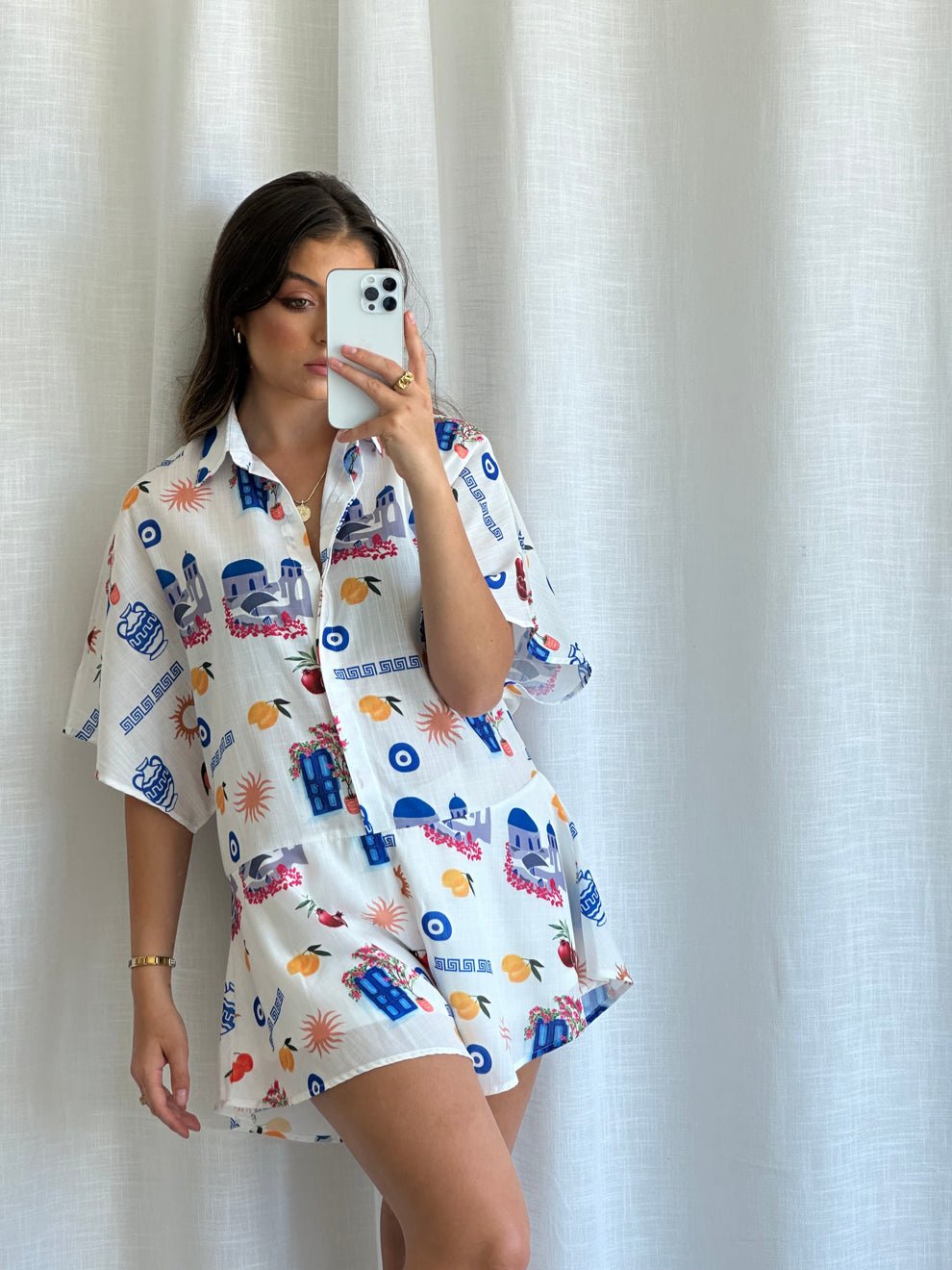 Front view of Frankie printed playsuit, short sleeves with lined shorts in cotton blend fabric.