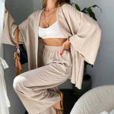 Close-up of the Zafira Pants and Cardigan Two Piece Set in beige showing the soft cotton-linen fabric.