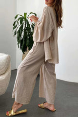 Side view of the Zafira Pants and Cardigan Two Piece Set highlighting the draped cardigan fit.