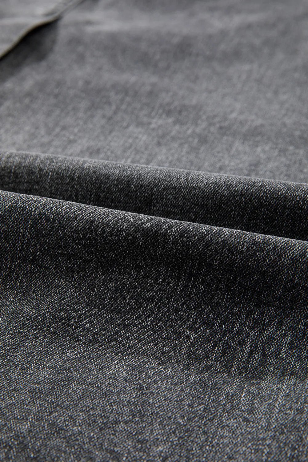 Zoomed-in texture view of the premium denim fabric of the Zuri Maxi Denim Skirt.