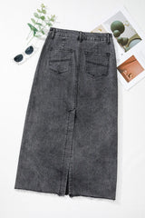 Flat lay rear view of the Zuri Maxi Denim Skirt in Black, showcasing clean seam and pockets.
