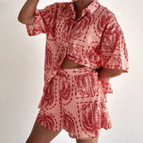 Lifestyle shot of Calico Watermelon Two Piece Set styled casually indoors.