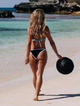 Back view of the Coco Bikini Set featuring back tie and minimal coverage bottom.