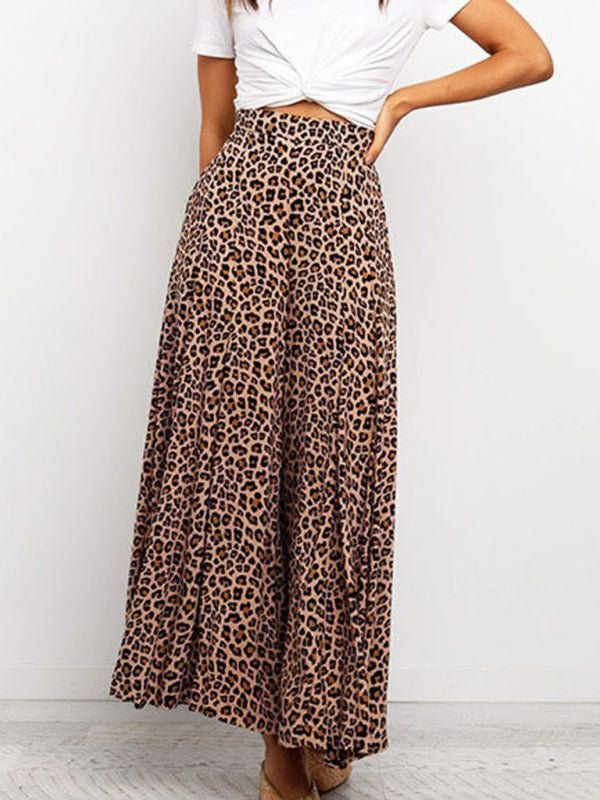 Leopard print wide-leg pants worn by a woman on a plain background