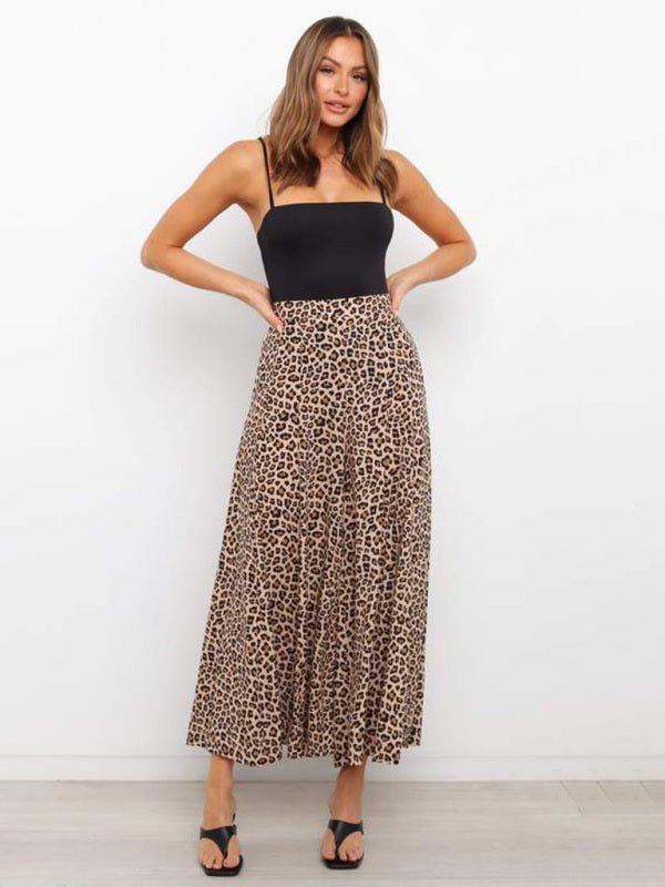 Leopard print wide-leg pants worn by a woman on a plain background