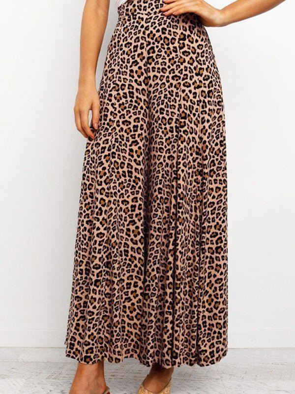 Leopard print wide-leg pants worn by a woman on a plain background