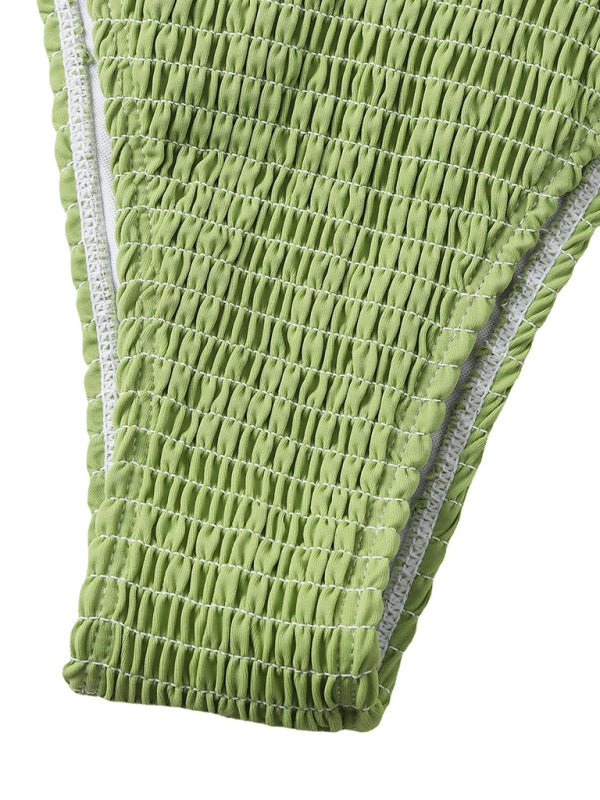 Flat lay of the Midori Summer Bikini bottoms with lace-up sides.