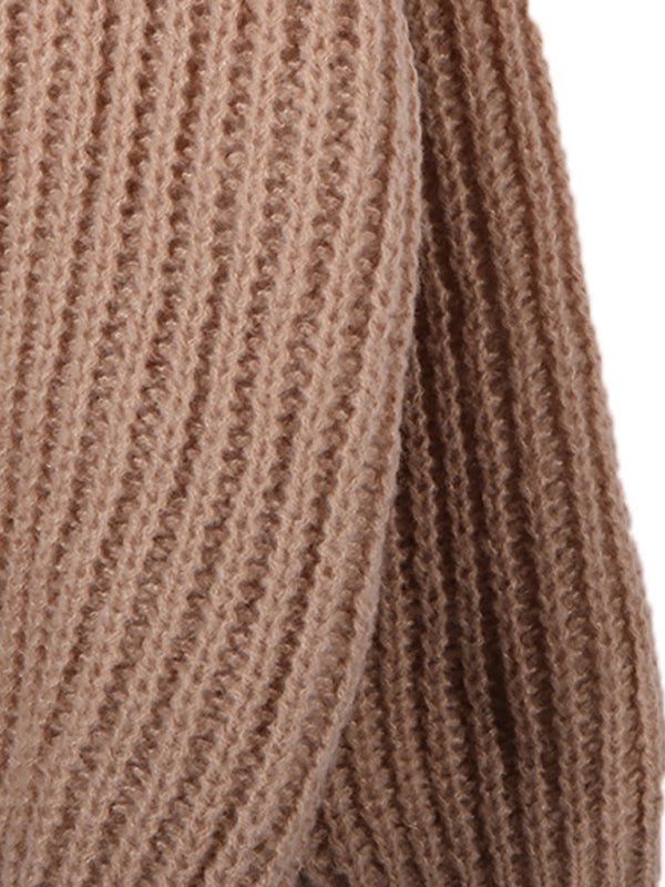 Zoomed-in view of the sleeve stitching and thick knit fabric of the More Of Me Knit.