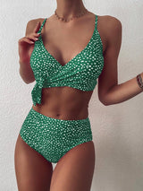 Model wearing green polka dot bikini set with V-neck wrap top and high-waisted bottom.
