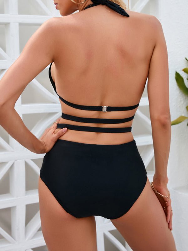 Black halter one‑piece swimsuit with elegant ruching and supportive neckline back view