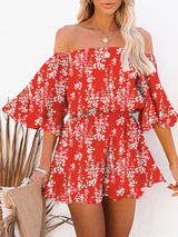 Red floral Adelaide Chiffon Playsuit styled with natural accessories