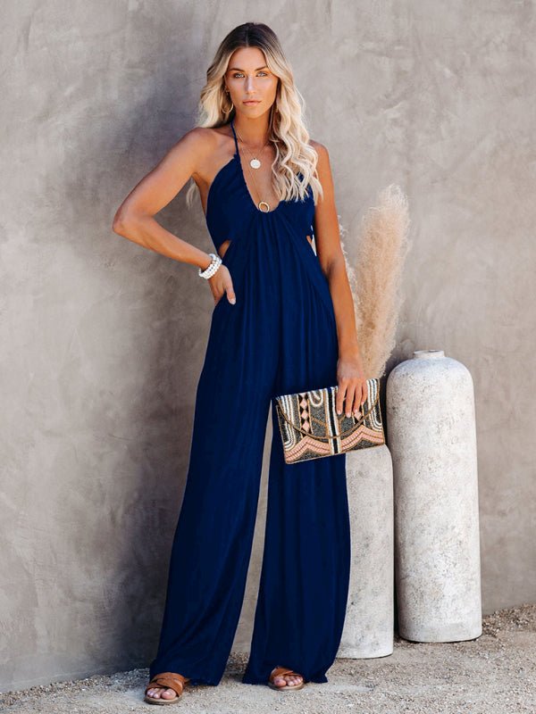 Aubrielle Jumpsuit in navy, styled with minimal jewellery and heels