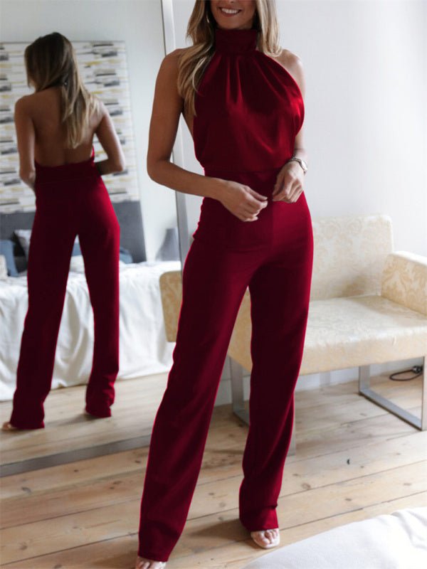 Rear view of burgundy Blathin Jumpsuit, showing open back design and high-waisted trousers.