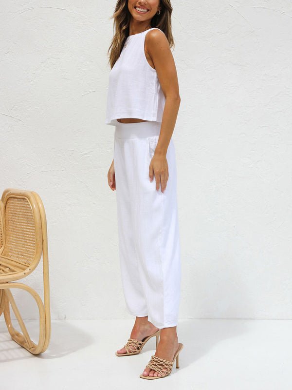 Side view of white women’s two piece set with button-back sleeveless top