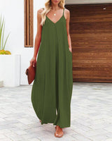 Woman wearing The Harlot Jumpsuit in earthy green, front view, wide-leg summer jumpsuit.