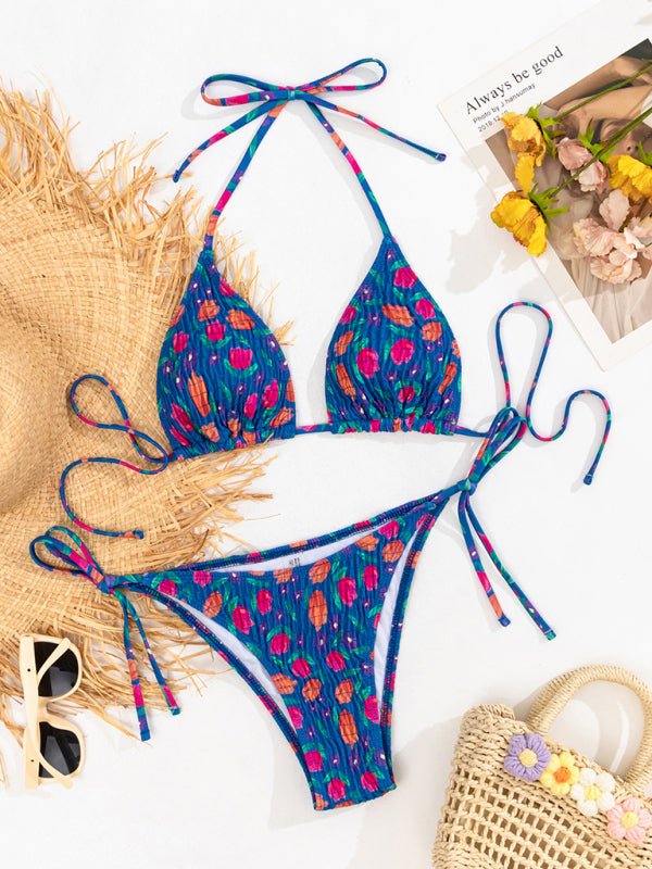 Flat lay of the Jasmine Pleated Bikini set with floral pleated fabric.