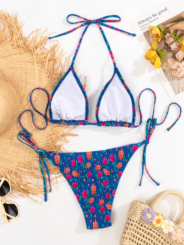 Flat lay of the Jasmine Pleated Bikini set with floral pleated fabric.
