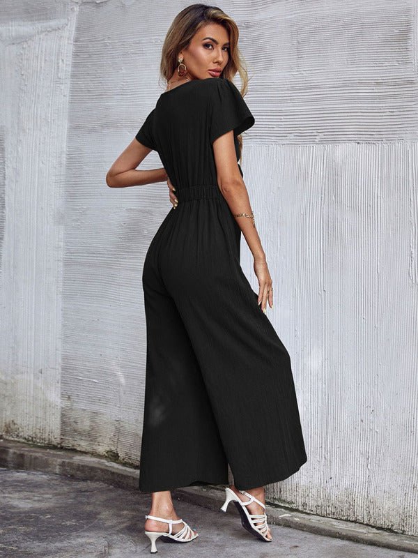 Back view of black Yarkona Jumpsuit showing soft drape and relaxed fit